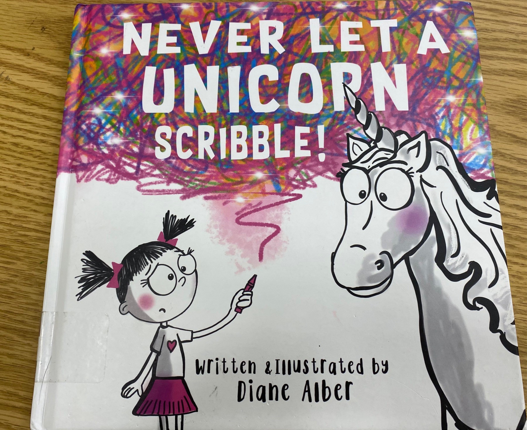 Never Let A Unicorn Scribble by Diane Alber