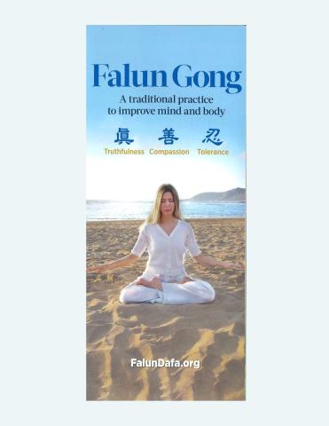 woman meditating on the beach 